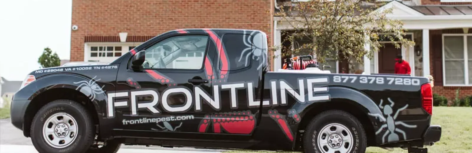 Frontline Pest truck outside home